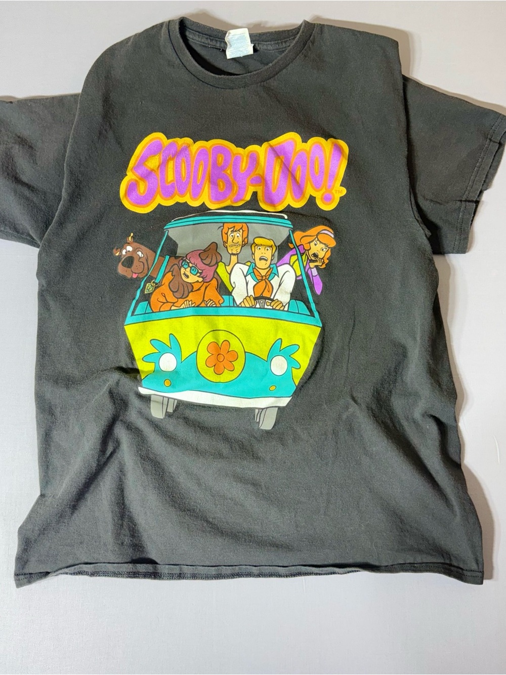Vintage Black Scooby-Doo Graphic Tee with Turquoise, Yellow & Purple Art